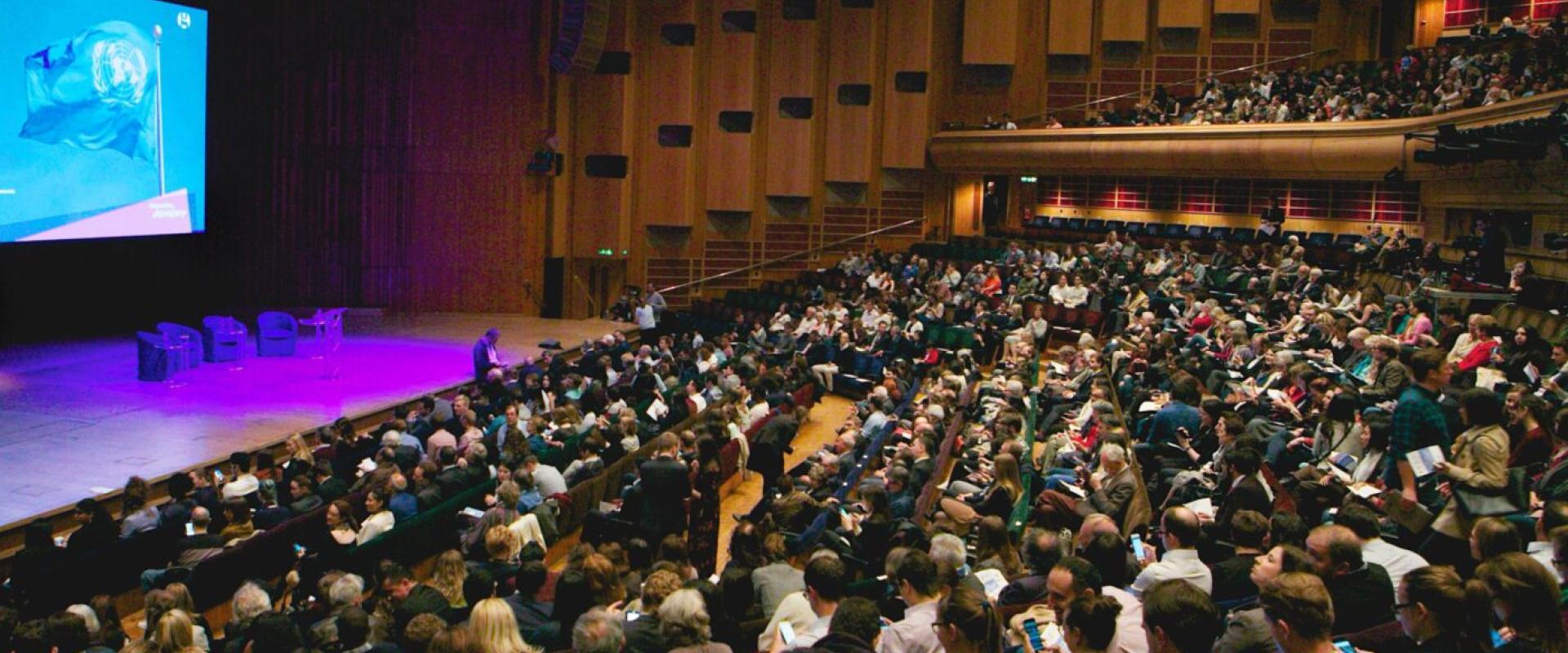 Image fo a large audience in Methodist Central Hall Westminster, London